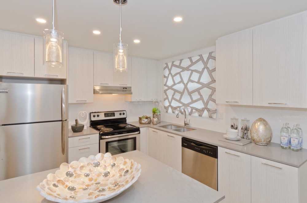 1 Bedroom + Den Premium at Centre Pointe West